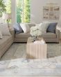 Karina 69G6F Ivory/Blue/Tan Area Rug