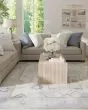 Karina 69G6F Ivory/Blue/Tan Area Rug