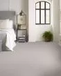 Smart Thinking Lady in Gray Carpet