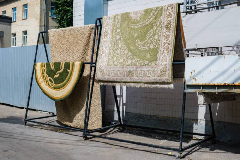 Hang the rug or lay it flat to dry