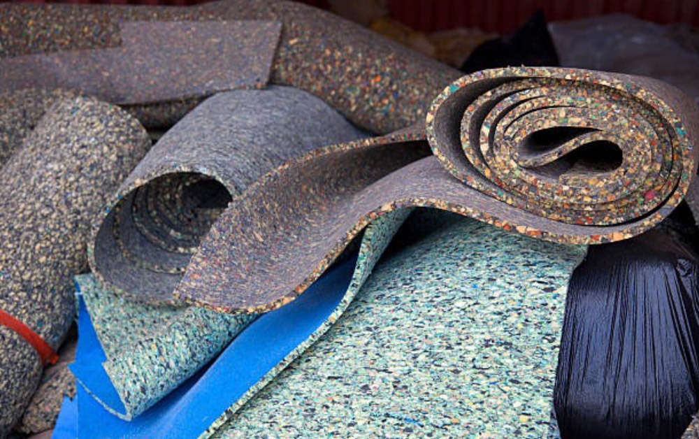 Rolls of carpet padding